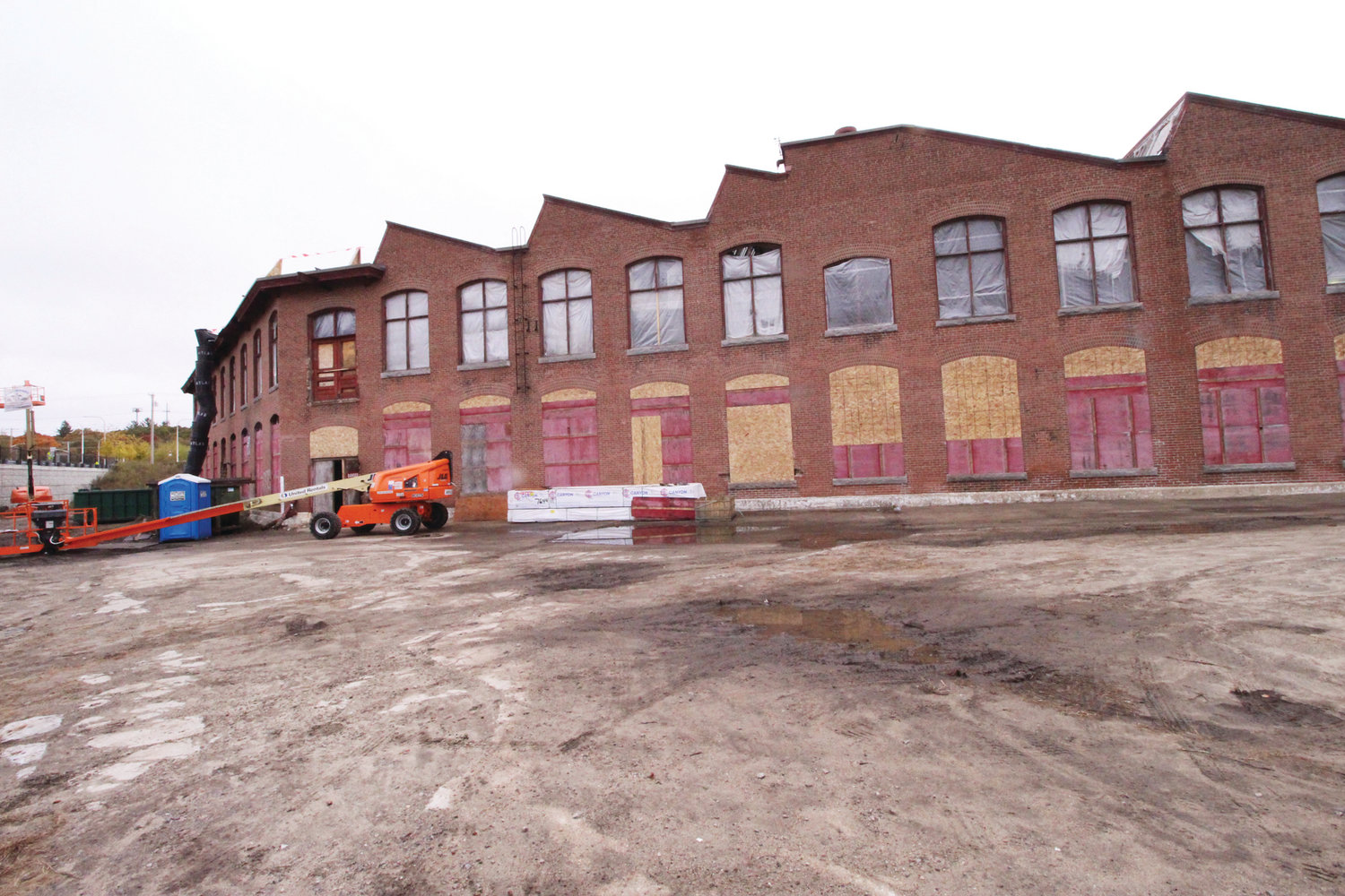 The exterior of the historic Sawtooth Building, with a unique appearance that was first constructed in 1905, and served as part of the Apponaug Mills. It is being transitioned into the modern service headquarters for AAA Northeast. It will be opening in the fall of 2020.